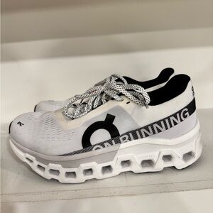 On Running men’s  Athletic Shoes in White and Black